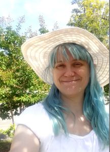 A few weeks ago, my hair had lightened to a lovely pastel blue. I often wear a hat outside on sunny days to keep it from fading faster.